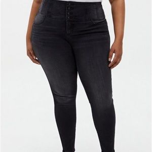 Torrid black corset skinny jeans. Size 16 short. NWT